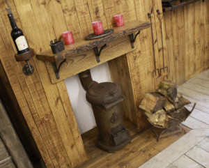 Cottingham Collection Log Holder next to fireplace